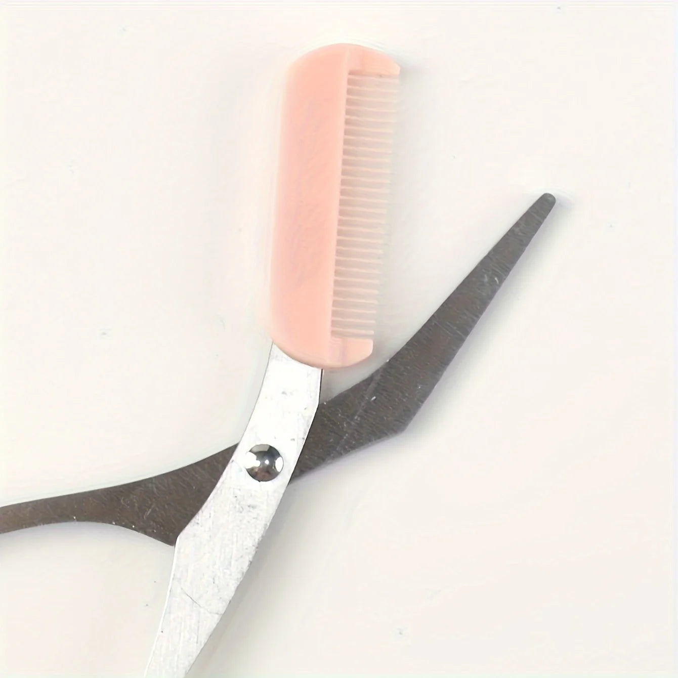 Pink eyebrow trimming scissors with built-in comb - stainless steel, precise grooming tool, creating perfect eyebrows | 3